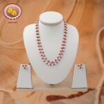 2 Lines Coral and Pearls Set – Elegant freshwater pearl and coral necklace with matching earrings.
