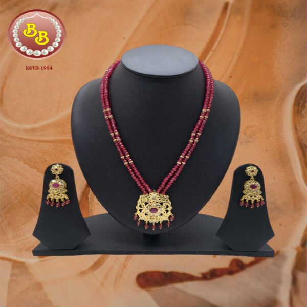Beautiful Polki Pendant Set With Ruby Color Beads