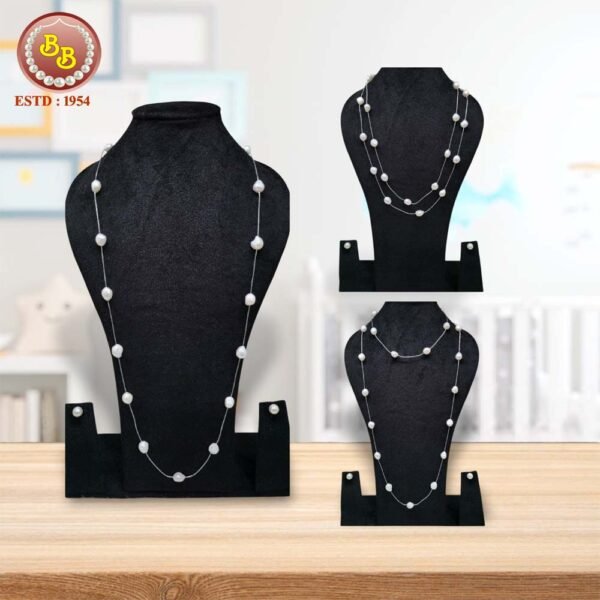 "Designer pearl jewelry set 4 featuring artistic asymmetrical arrangements with mixed pearl shapes in contemporary innovative design"
