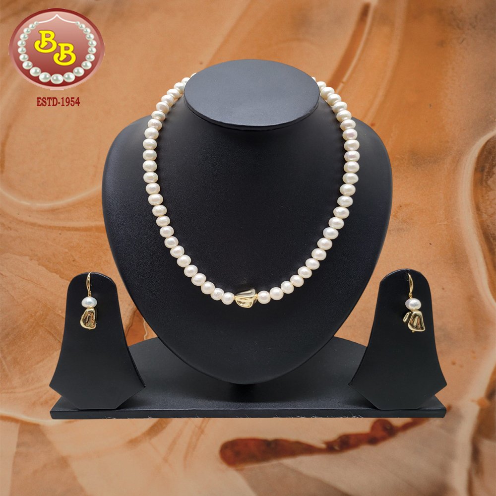 Pearls Set 1 "Sophisticated pearl jewelry set 24 featuring elaborate statement design with museum-quality cultured pearls in luxury arrangement"
