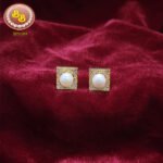 Sophisticated white pearl cufflinks for men's formal shirts, adding refined elegance.