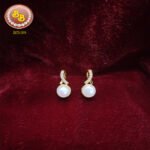 Pearl and cubic zirconia stud earrings elegant design