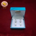 Traditional pearl hanging jhumka earrings